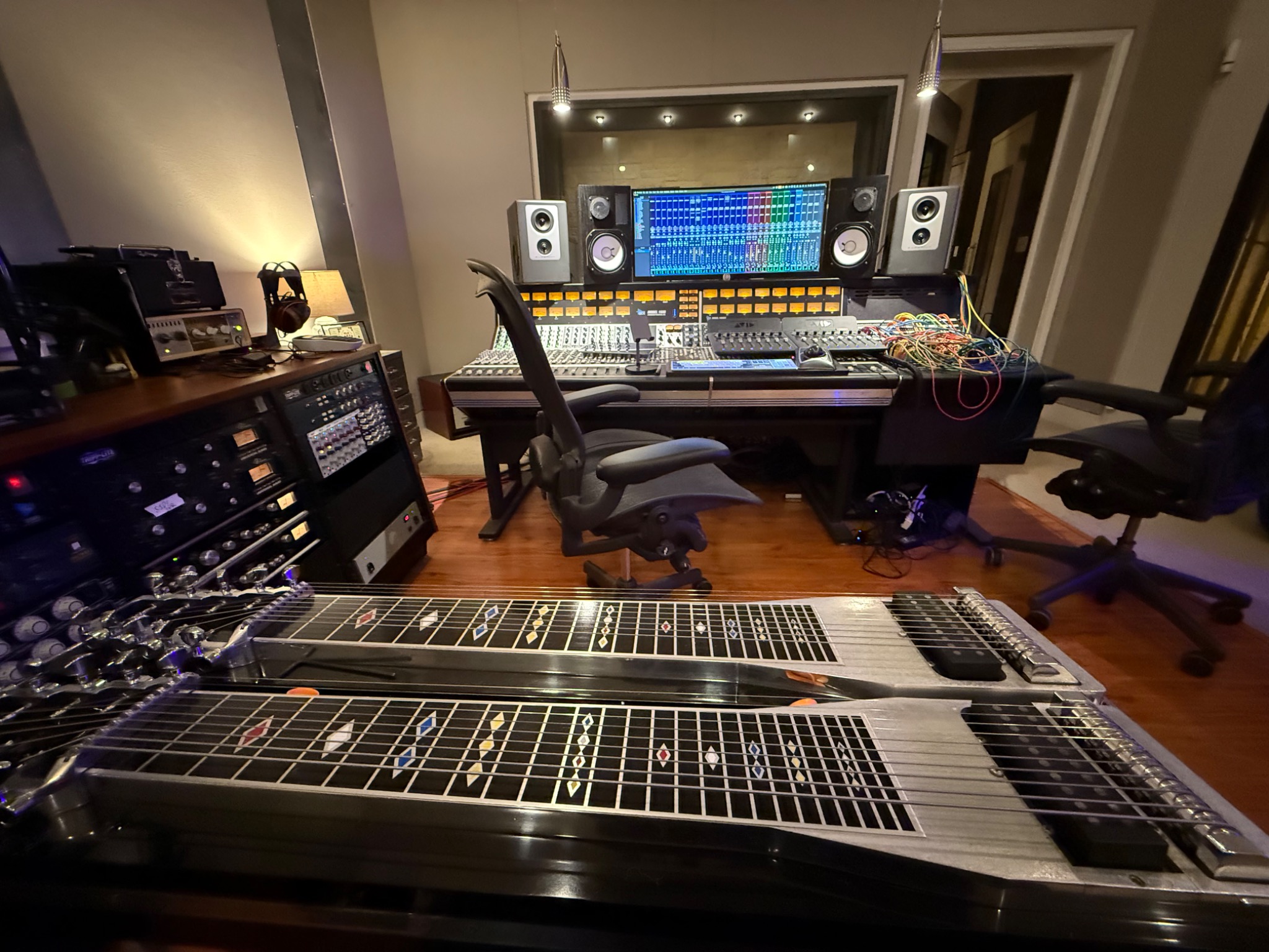 Pedal steel in front of the console during a Flatland Cavalry recording session